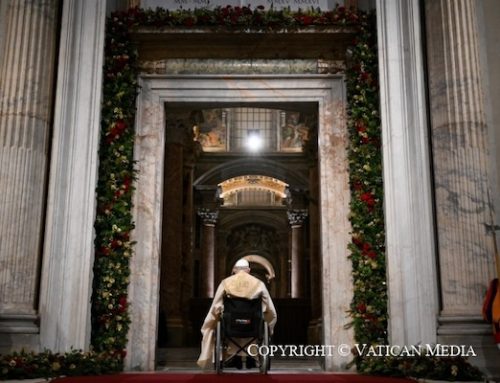Pope Francis opens the door at St. Peter’s, beginning the Holy Year